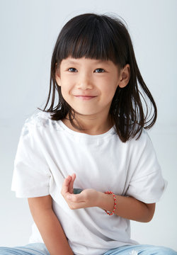 Asian child with a crystal in hand