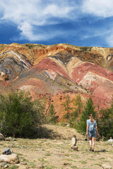 Obraz premium Woman in valley of Mars landscapes in the Altai Mountains, Kyzyl Chin, Siberia, Russia