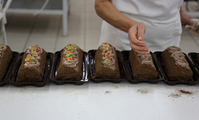 Freshly baked confection in bread and sweets factory