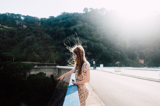 girl on water dam