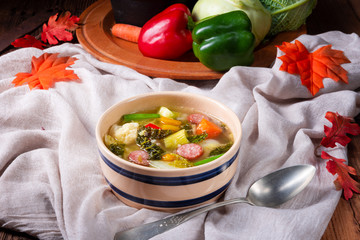 delicious autumnal vegetable soup with sausage and bacon