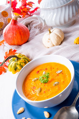 healthy pumpkin soup with ginger carrots and coconut milk