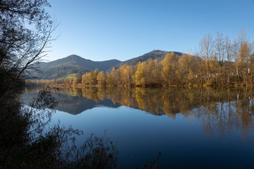 autumn on mur river near village deutschfeistritz in styria, austria