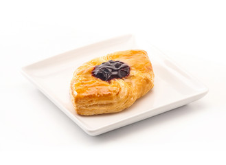 Delicious Danish pastry on white background