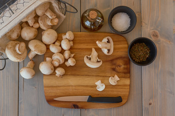Champignon mushrooms on a cutting board