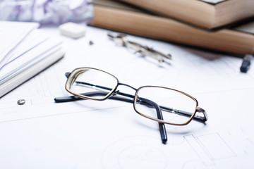Glasses on the details of the drawing