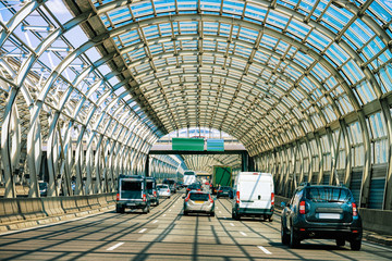 Car traffic on tunnel bridge in Warsaw in Poland