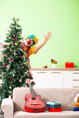 Funny clown in Christmas celebration concept 