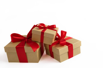 Gift boxes wrapped in red ribbon bow. Isolated.