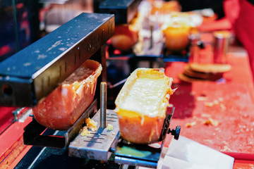 Raclette Cheese Food in Night Christmas Market at Gendarmenmarkt Berlin