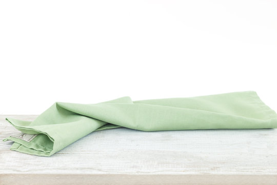 Empty wooden table with tablecloth
