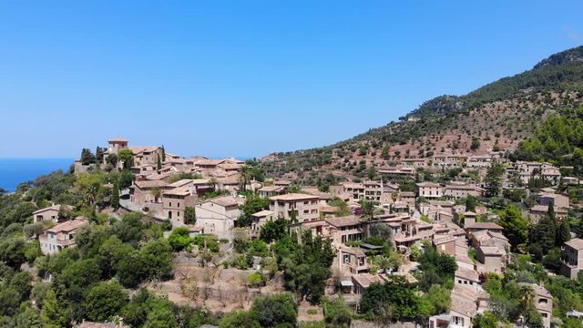 Flight over Mountain Village Deia in Mallorca Tramuntana Mountains, Region Valldemossa and Soller