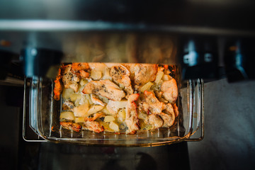 Delicious gourmet potato with fried meat in bowl
