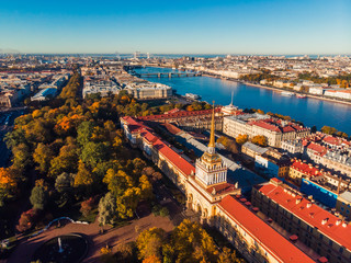 Autumn cityscape top view aerial dron, yellowed foliage in Park near main Admiralty of St. Petersburg