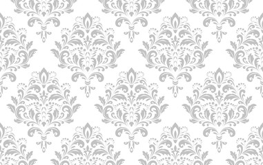 Floral pattern. Vintage wallpaper in the Baroque style. Seamless vector background. White and grey ornament for fabric, wallpaper, packaging. Ornate Damask flower ornament.