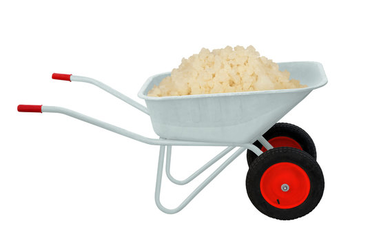 wheelbarrow with red wheels. Comstruction or gardening tool.