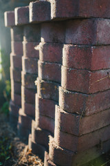 Naklejka premium Brickwork on the street in the summer sunlight.