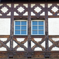 Germany, two windows of traditional  half-timbered house building