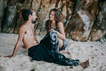 Lovely couple flirting at the beach