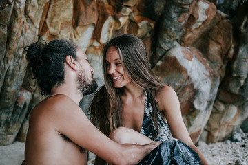 Fototapeta premium Lovely couple flirting at the beach