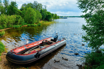 Fototapeta na wymiar Boat on Onega Lake and Nature of Karelia