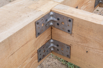 Closeup on pile foundations support the floor. Closeup of the mount base floor of a frame house