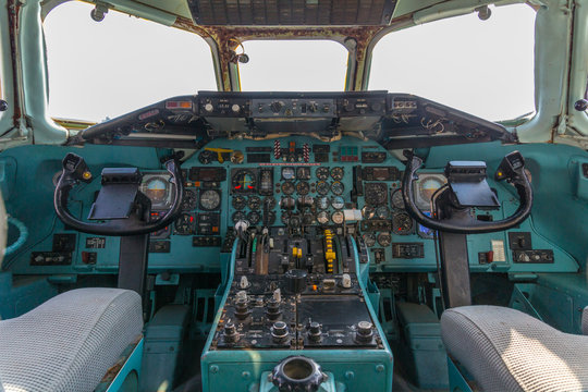 Old analog cockpit of an airliner airplane 
