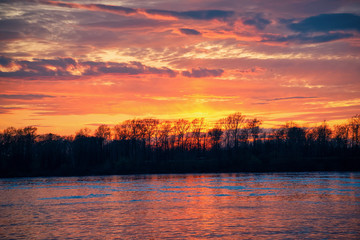 Naklejka premium Dramatic sunset over Volga River in Uglich