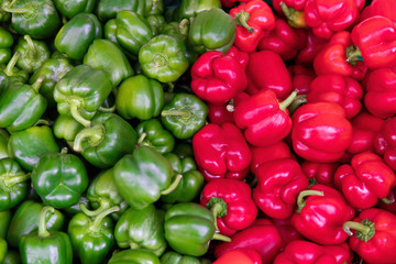 Obraz na płótnie Canvas Close up group of fresh green and red organic Palermo sweet chilli pepper in a basket at the gourmet or market.Vegetables in the tray market agriculture farm.