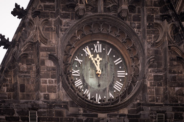 Fototapeta na wymiar Tower clock five minutes to twelve