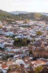 Aerial view at sunset of the village with white houses of Cortegana, in the saw of Huelva, Spain