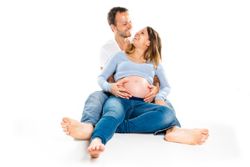 A Pregnant woman with man on studio isolated on white