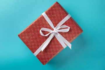 red gift box on blue background