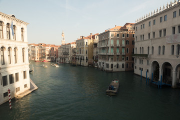 Canals and main rialto canal in many different views on a mid autumn day. Colorful architecture show old italian heritage 