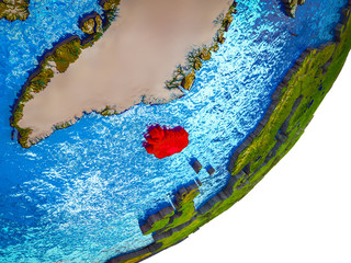Iceland on 3D model of Earth with water and divided countries.