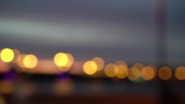 City lights in the background with blurring lights bokeh