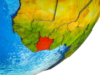 Ivory Coast on 3D model of Earth with water and divided countries.