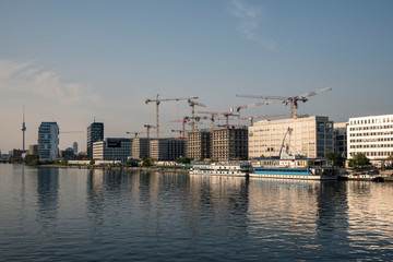 The Spree bank at East Side Gallery with the new controversial buildings like Zalando Headquarter.