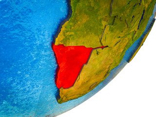 Namibia on 3D model of Earth with water and divided countries.