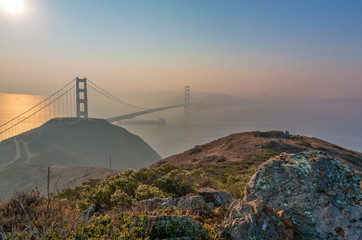 Fototapeta premium Smoke over Golden Gate Bridge