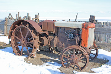 Fototapeta na wymiar Vintage tractor in winter