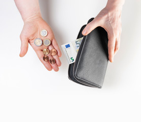 Minimum wage in Germany, purse with 9,19 euro banknotes and coins