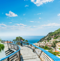 Girl on a terrace by the sea in world famous Positano