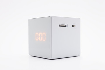 White, square digital clock on white background with clipping path.
