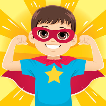 Super happy funny and cute little hero boy flexing arms showing strength