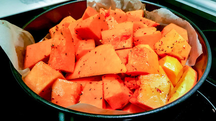 Slices of pumpkin in the pan.