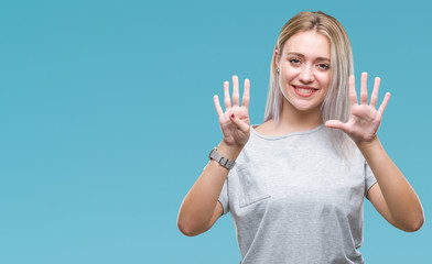 Young blonde woman over isolated background showing and pointing up with fingers number nine while...