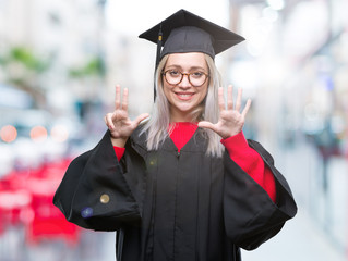 Young blonde woman wearing graduate uniform over isolated background showing and pointing up with fingers number eight while smiling confident and happy.