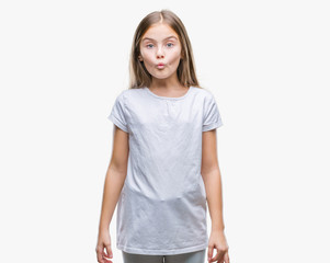 Young beautiful girl over isolated background making fish face with lips, crazy and comical...