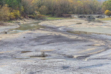 View of Barrea Lake almost dry, Lake Barrea, Abruzzo, Italy. October 13, 2017